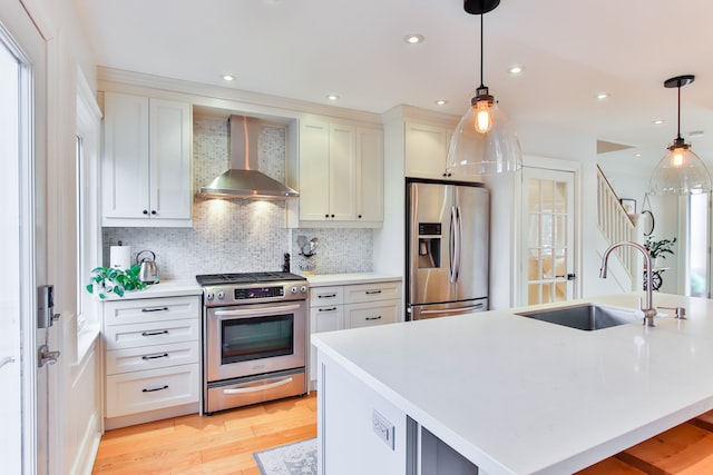 Large white kitchen with cabinets, stainless steel appliances, and granite countertops